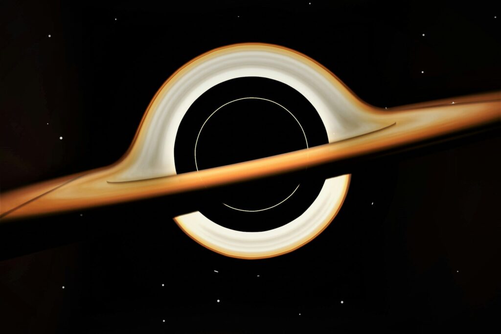 render przedstawiający czarną dziurę